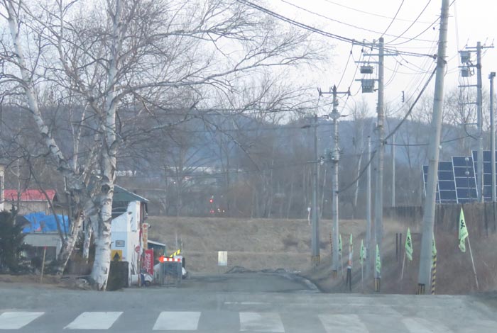 webnews今朝の北見/交差点から奥が無加川の右岸堤防